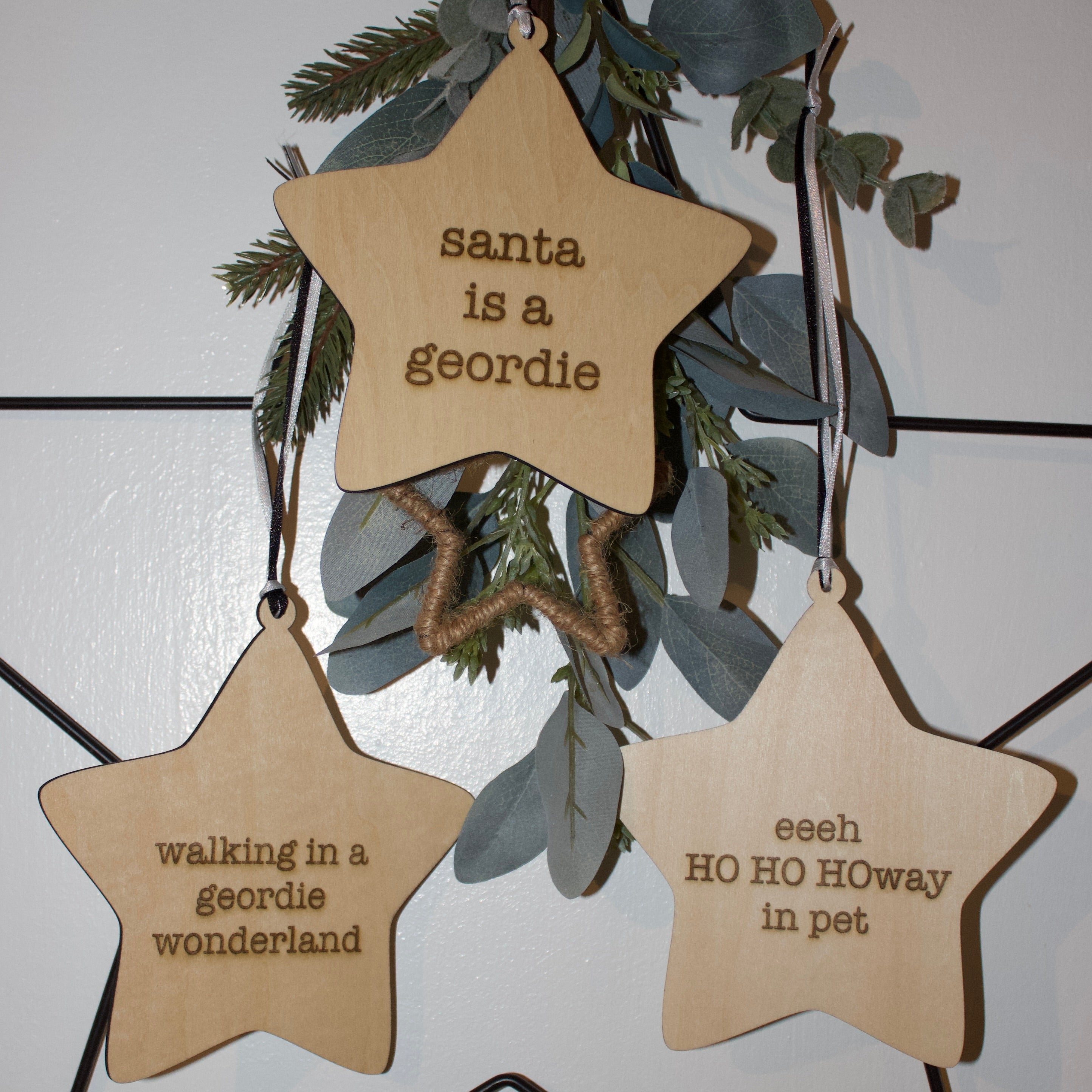 'Walking in a Geordie Wonderland' Hanging Wooden Christmas Star Sign